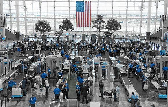 The huge number of TSA security at Denver International Airport are seen clearly when only the blue color is left behind. Photography by Peter Stanley, 2011.