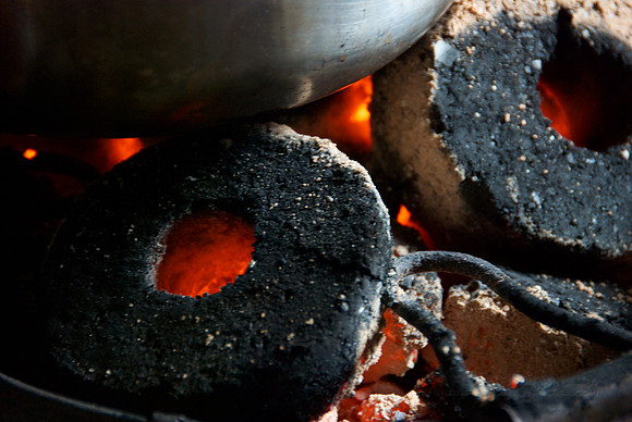 Legacy Foundation works with woman's project in Lushoto, Tanzania to develop alternative fuel from biomass, known as fuel briquettes. Photography by Peter Stanley, 2012.