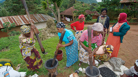 Legacy Foundation works with woman's project in Lushoto, Tanzania to develop alternative fuel from biomass, known as fuel briquettes. Photography by Peter Stanley, 2012.