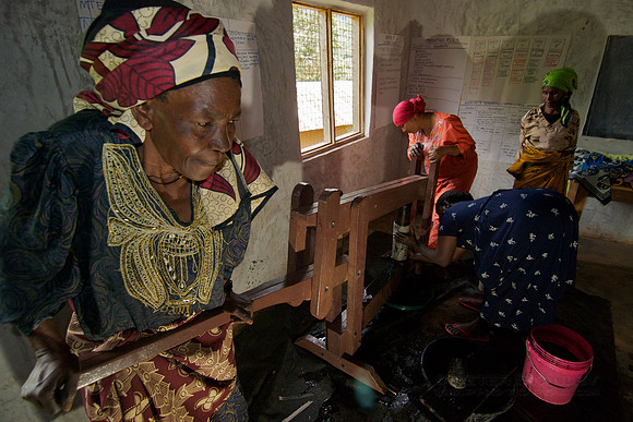 Legacy Foundation works with woman's project in Lushoto, Tanzania to develop alternative fuel from biomass, known as fuel briquettes. Photography by Peter Stanley, 2012.