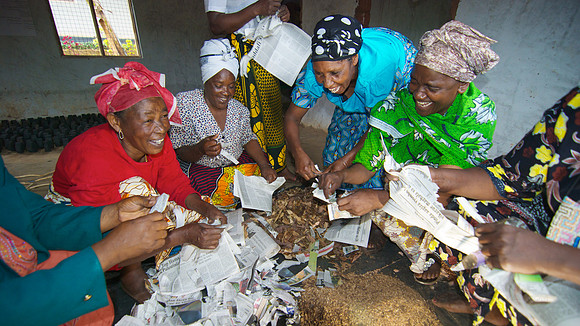 Legacy Foundation works with woman's project in Lushoto, Tanzania to develop alternative fuel from biomass, known as fuel briquettes. Photography by Peter Stanley, 2012.